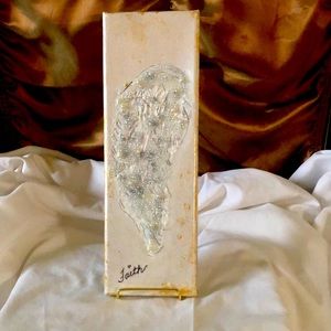 Angel wing crushed glass on canvas.
